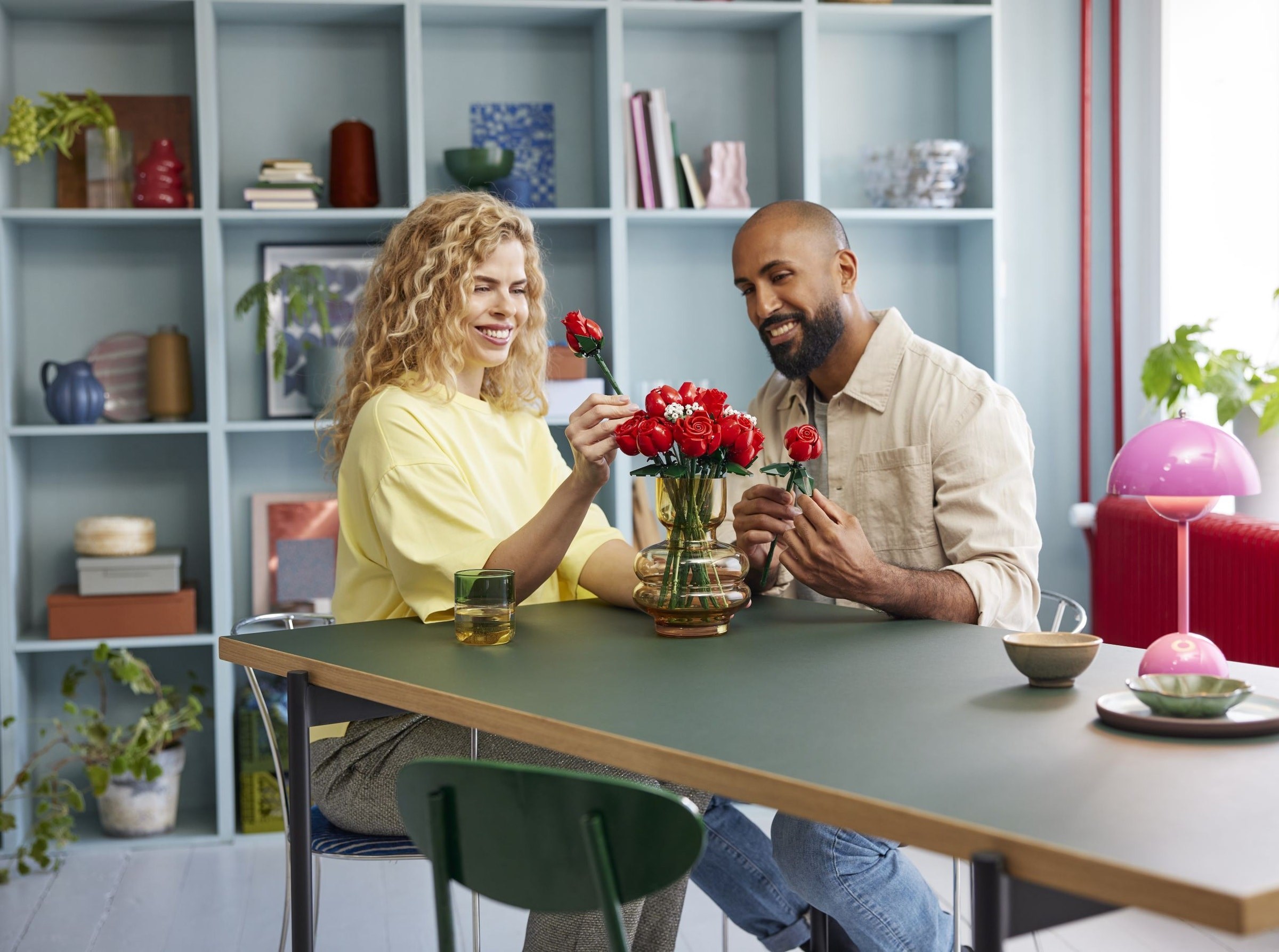 Couple building roses together