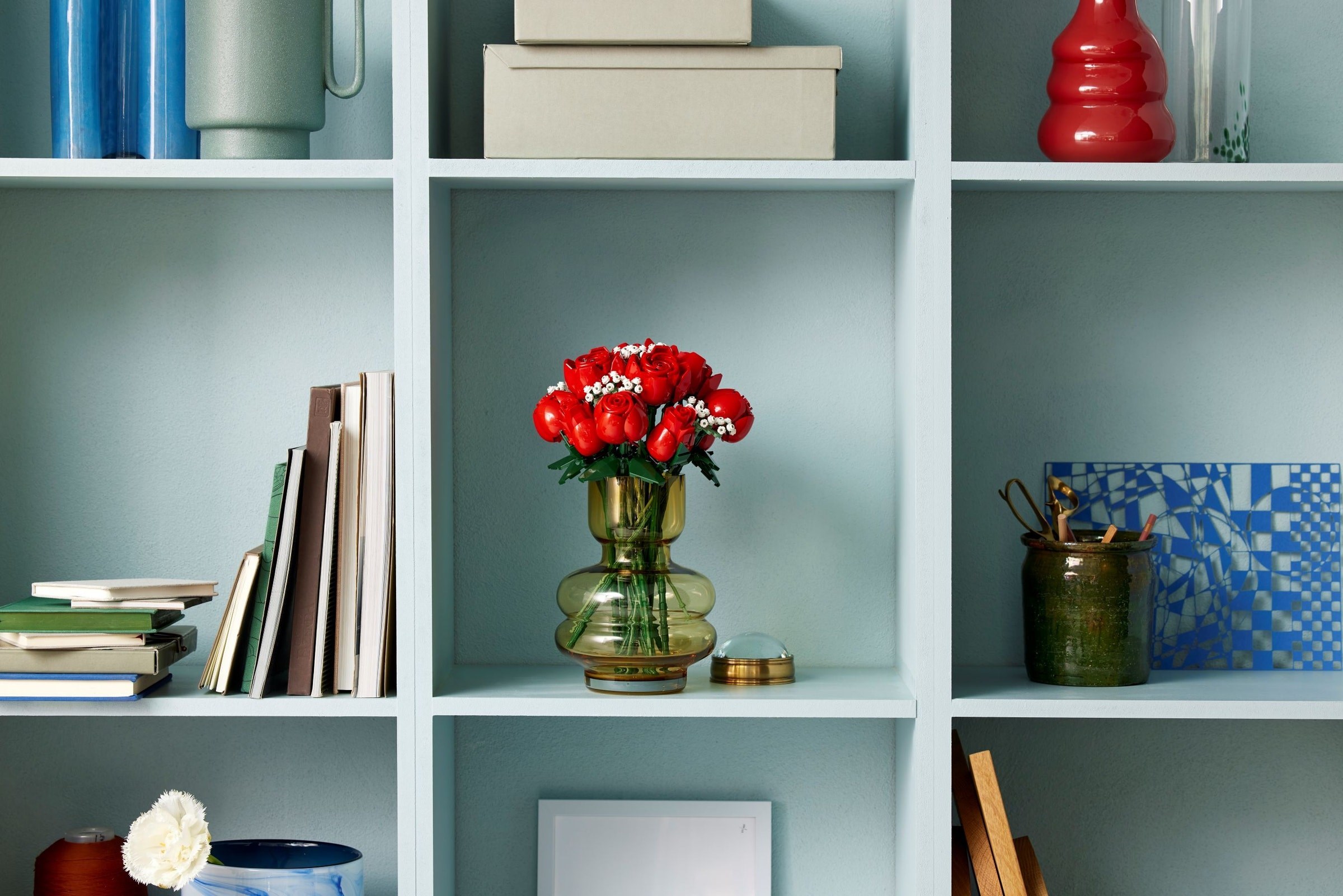 Display in home setting on bookshelf