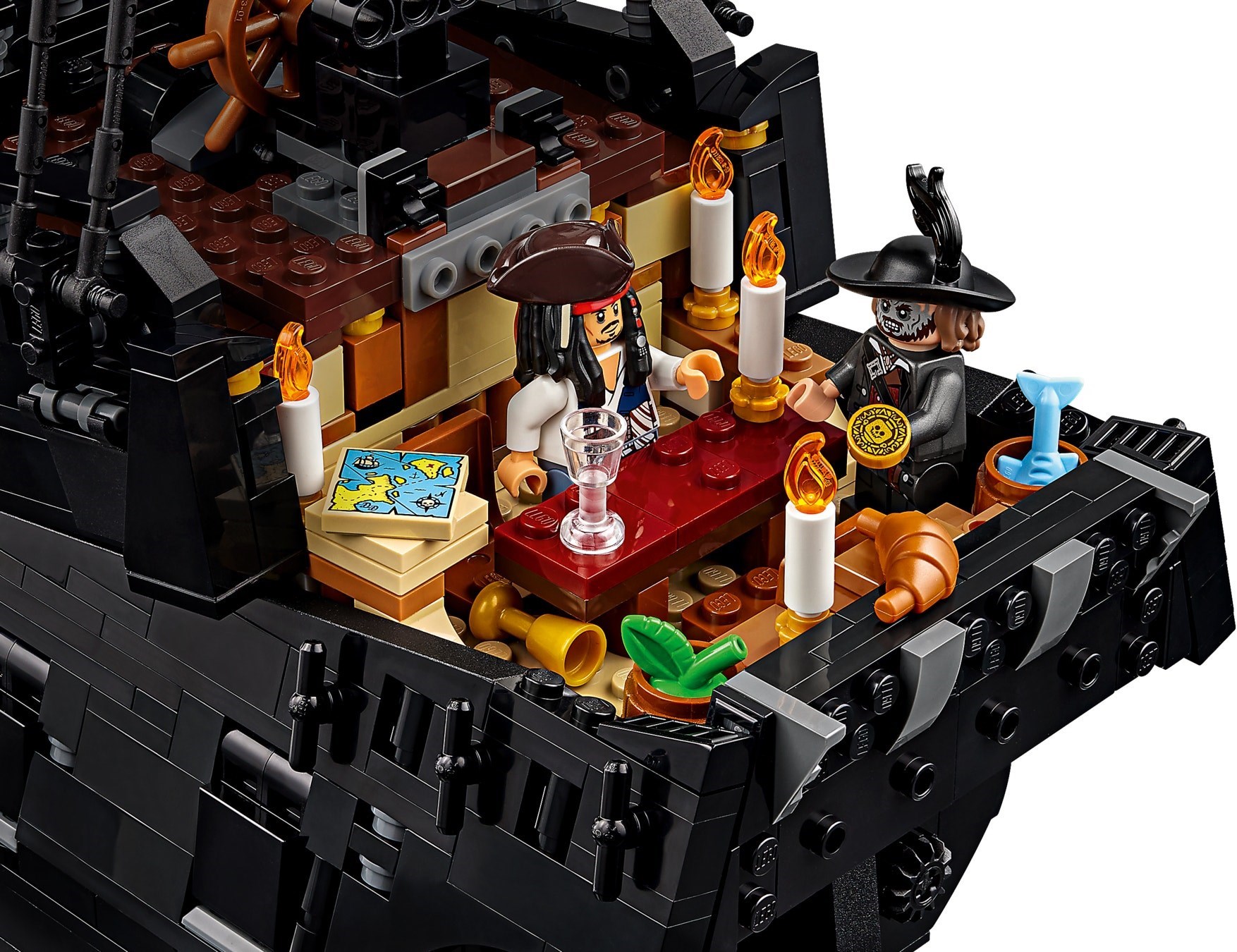 Detailed view of LEGO 10365 captain's quarters interior showing authentic pirate ship furnishings and treasure details