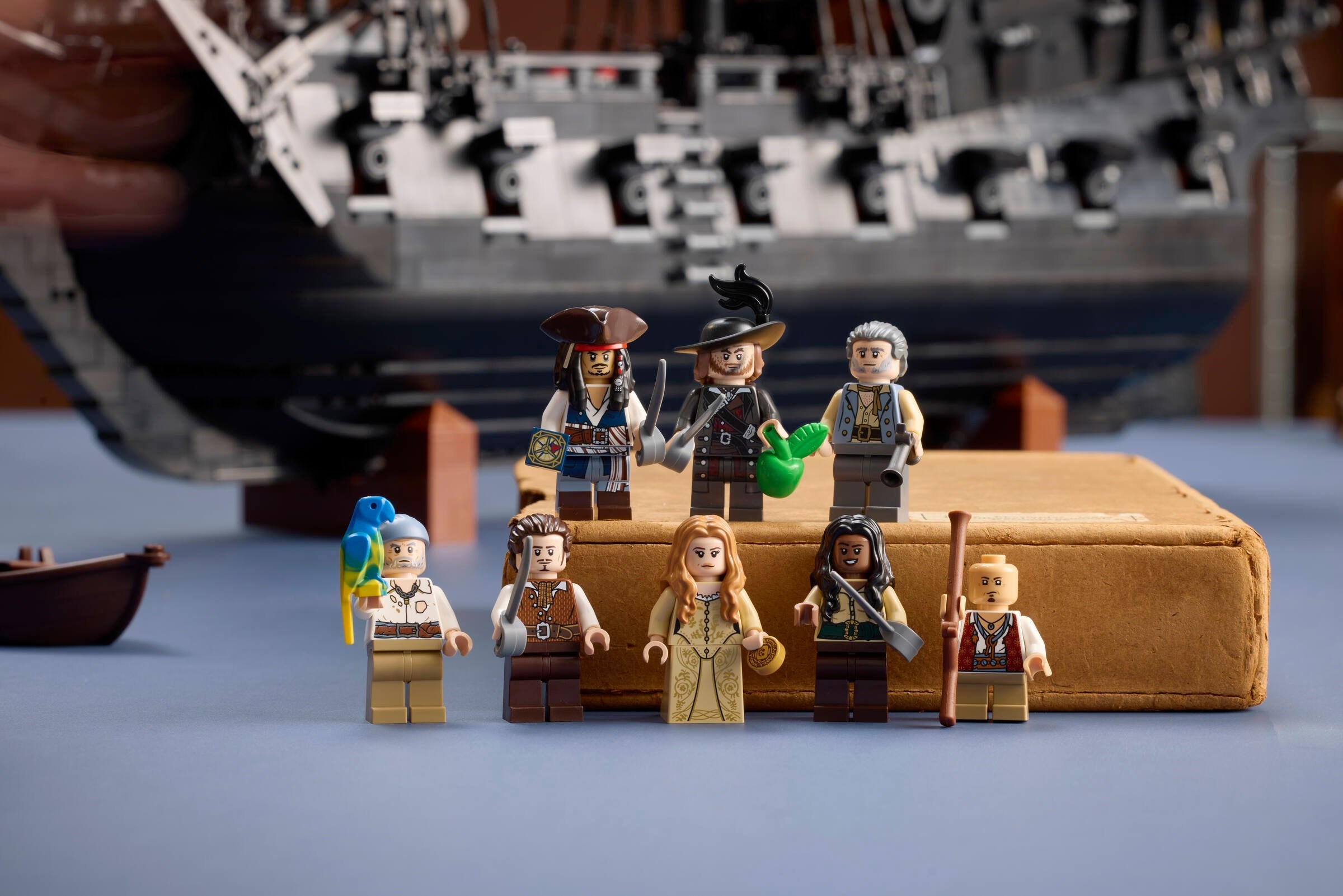 LEGO 10365 minifigure collection featuring Captain Jack Sparrow, Will Turner, Elizabeth Swann, and other Pirates of the Caribbean characters