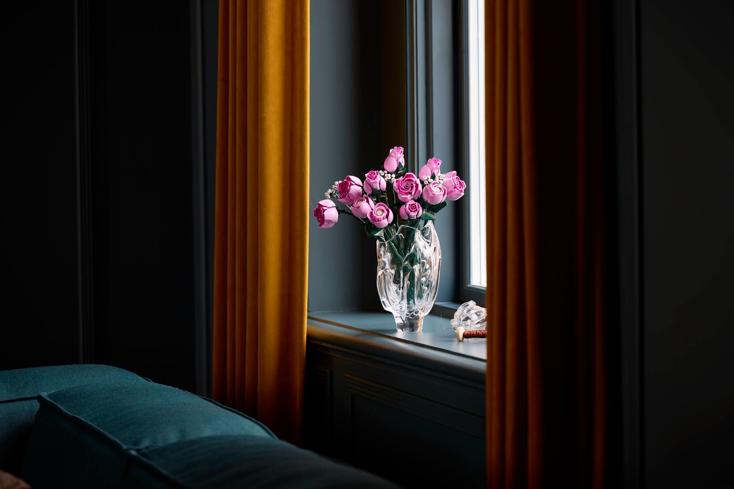 Elegant display of Pink Roses by window
