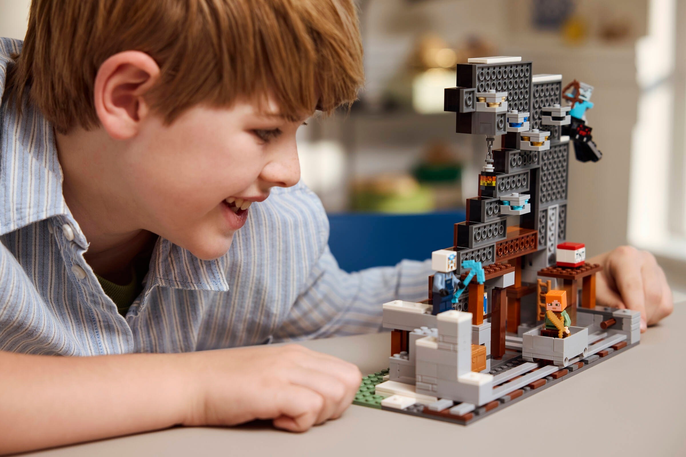 Child engaged with completed mining operation demonstrating play value