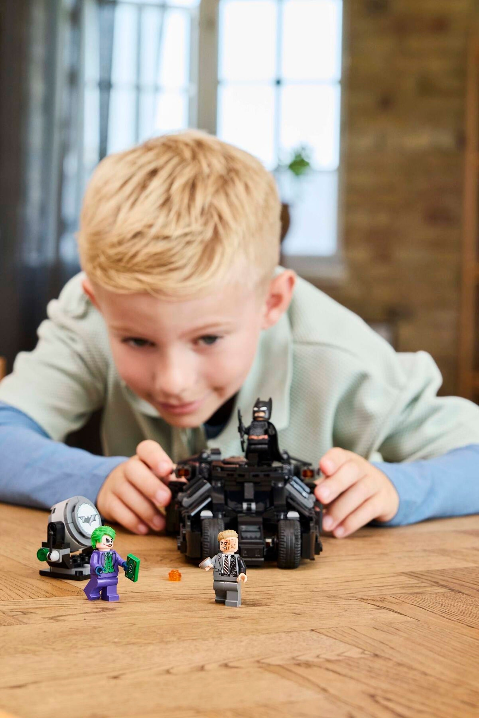 Child playing with Tumbler