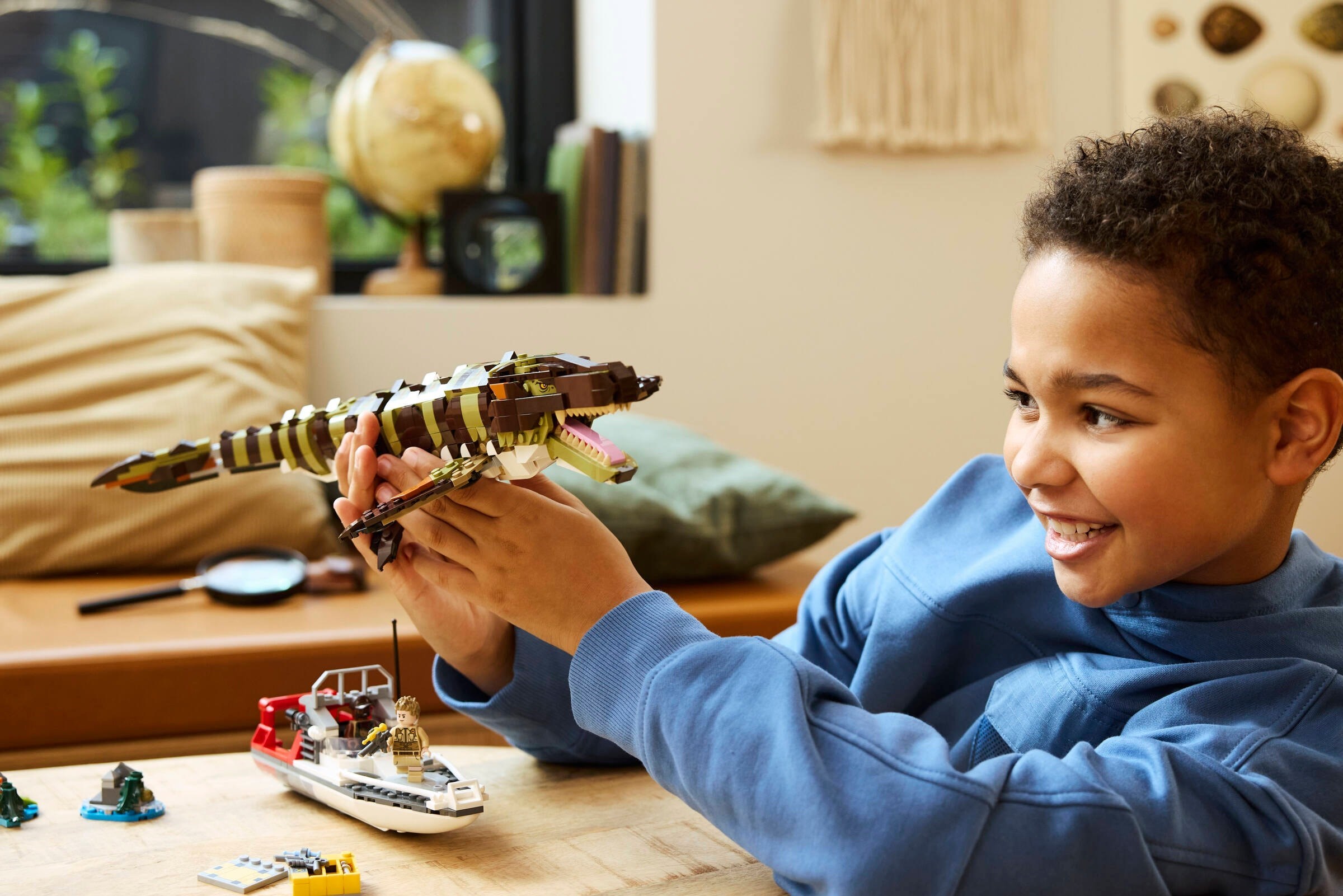 Child playing with Mosasaurus